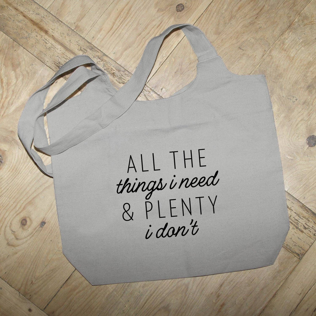 All the thinks I Need and plenty I don't / Grey Tote Bag: White Lettering