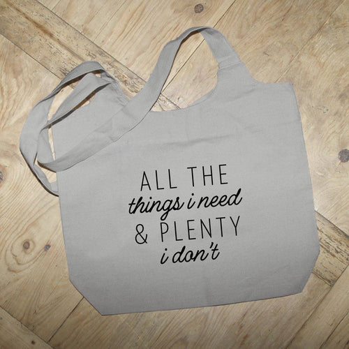 All the things I Need and plenty I don't / Grey Tote Bag: White Lettering